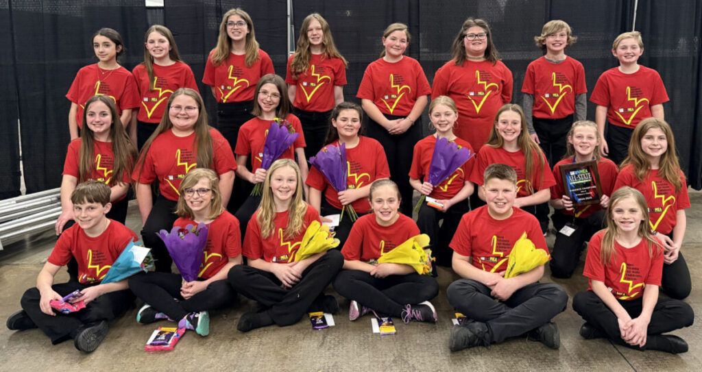 The chorus members are pictured from left. Row 1: Trevor Richards (CES), Avery Oliver (CES), Jacquelyn Hart (HES), Aubrey Gatts (HES), Everett Aubrey (HES) and Sara Kelley (WLES). Row 2: Gabrielle Dantrassy (GDES), Madison Burke (GDES), Jolyn Updegraff (CMES), Shasta Francis (CMES), Sydney Mlodsik (SHES), Brielle McClelland (MMS), Kadence Crawford (MMS) and Adalyn Bell (MMS). Row 3: Skyelynn Duymich (SMS), Jayde Carpino (SMS), Morgan Cooper (SMS), Abigail Clark (WLES), Kailynn Wesley (CES),  Maylee Bartsch (CES), Nathan Gomez (CES) and Jaxson Rine (WLES).